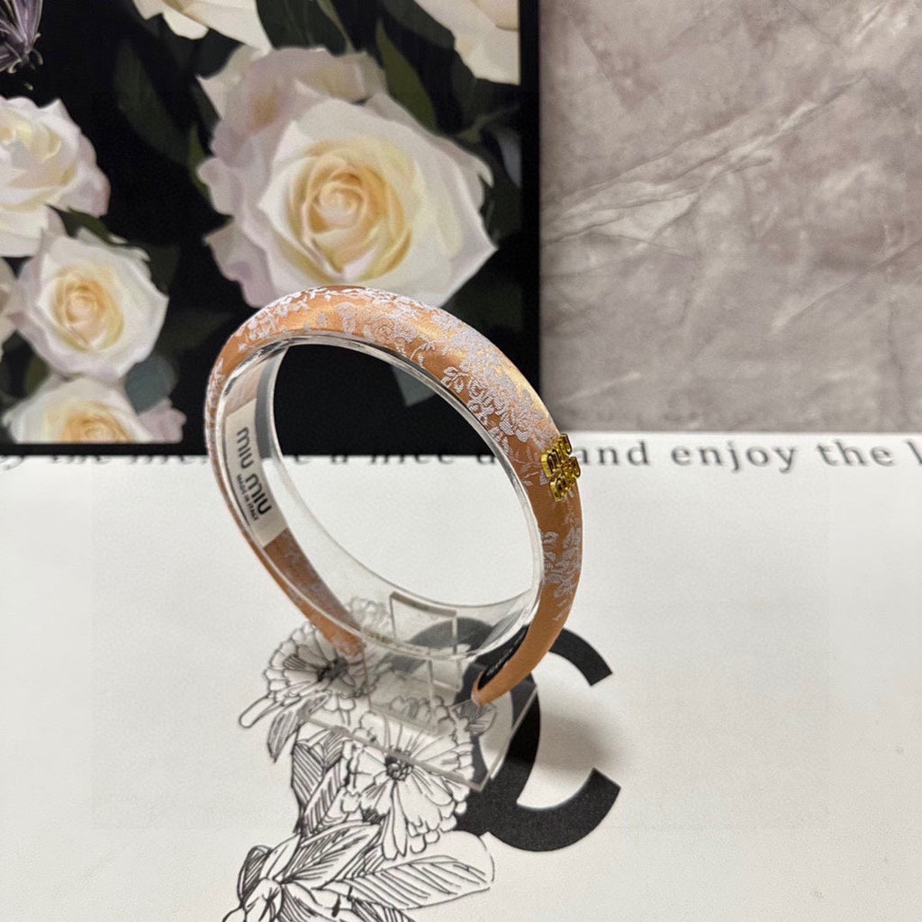 CHANEL HEADBAND WITH GARNITURE PRINT IN TIGER EYE ORANGE SILK 432822