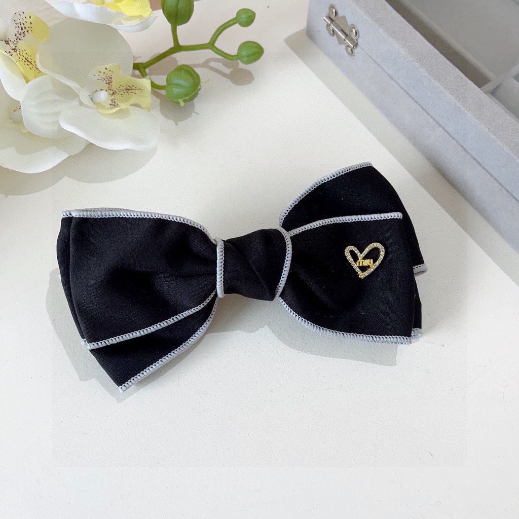 CHANEL BOW HAIRPIN IN BLACK AND WHITE TRIM COTTON 406022