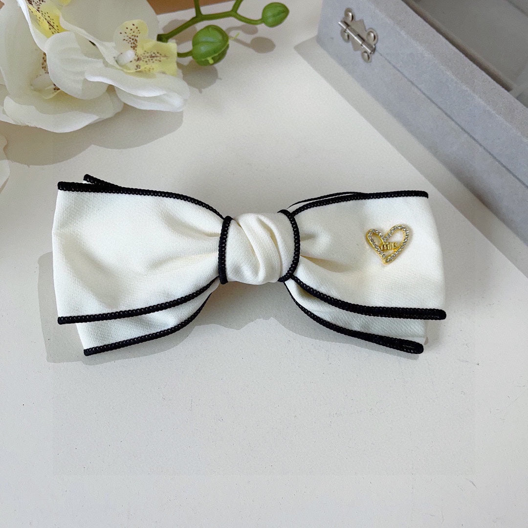 CHANEL BOW HAIRPIN IN WHITE AND BLACK TRIM COTTON 406023