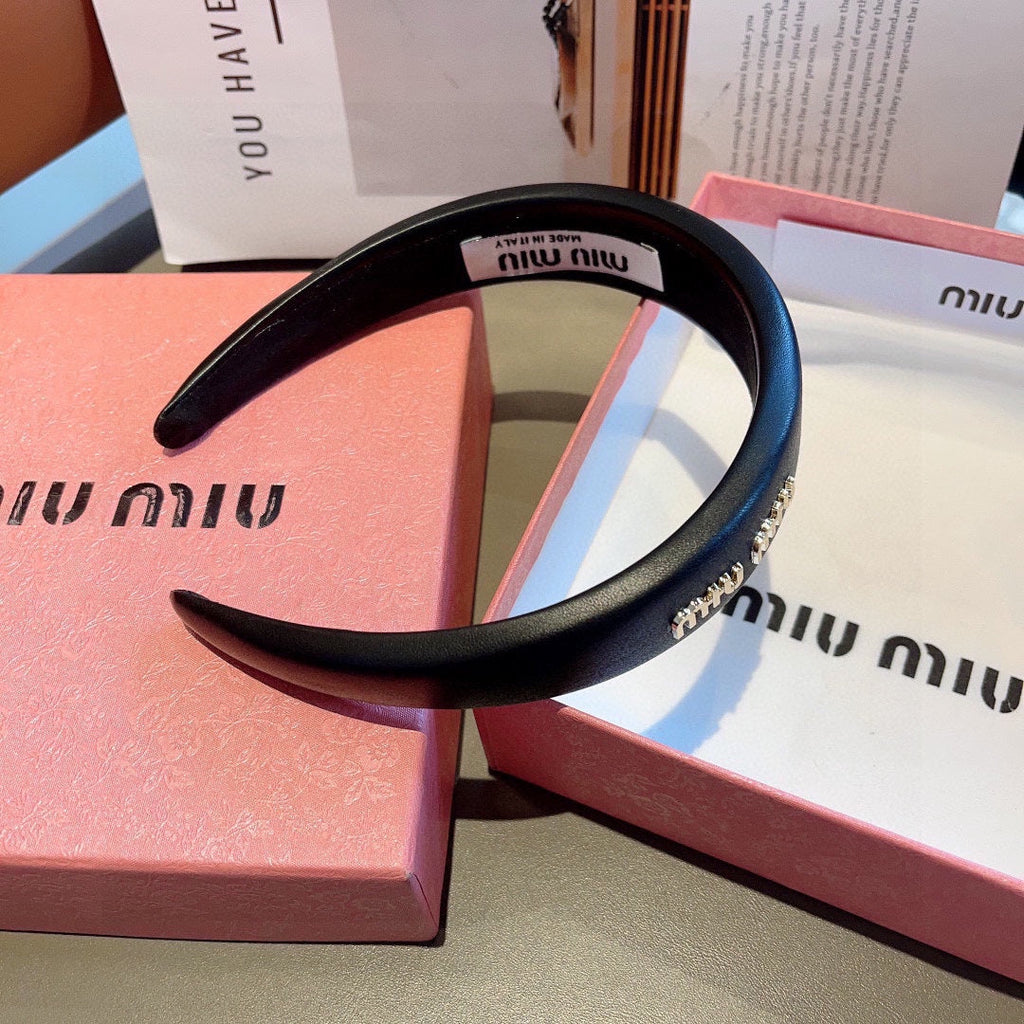 CHANEL THICK HEADBAND IN BLACK CALFSKIN GOLD LOGO 409395